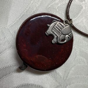 Elephant charm and pendant necklace with elephant toggle clasp on cord